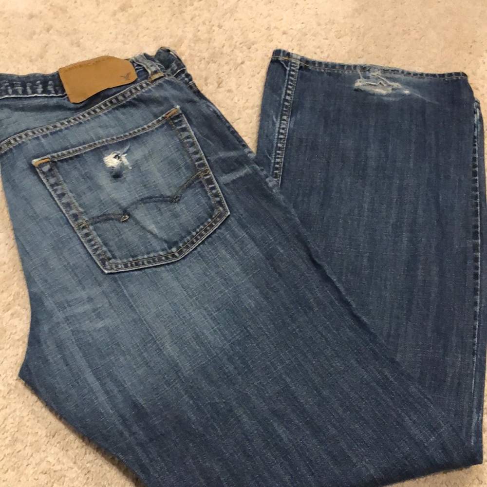 AE bootcut dark blue distressed jeans
